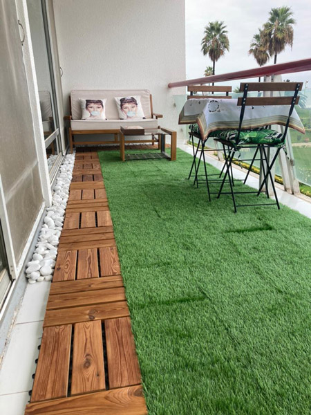 محوطه سازی با چمن و چوب